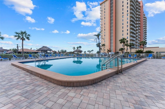 view of pool featuring a patio