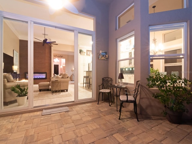 interior space featuring ceiling fan