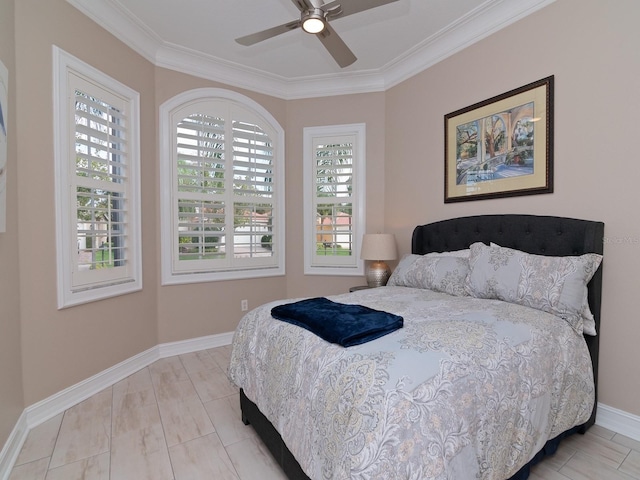 bedroom with multiple windows, ornamental molding, and ceiling fan