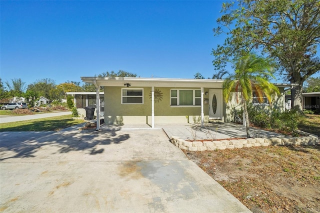 view of front of property with a sunroom