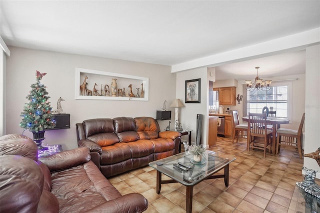 living room featuring a notable chandelier