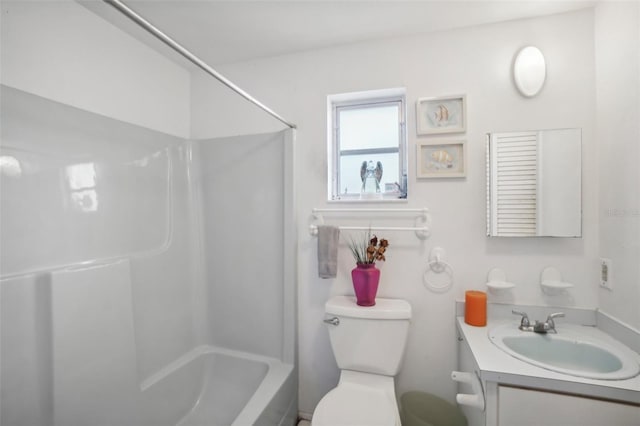 full bathroom with vanity, shower / bathtub combination, and toilet