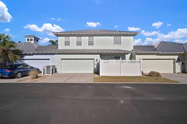 view of front property featuring central AC unit