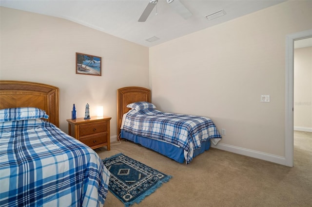 bedroom featuring light colored carpet and ceiling fan