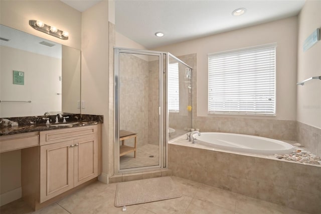 bathroom featuring tile patterned floors, vanity, and independent shower and bath