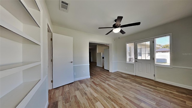 interior space featuring light hardwood / wood-style flooring and ceiling fan