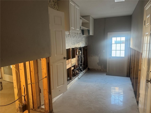 kitchen featuring white cabinets