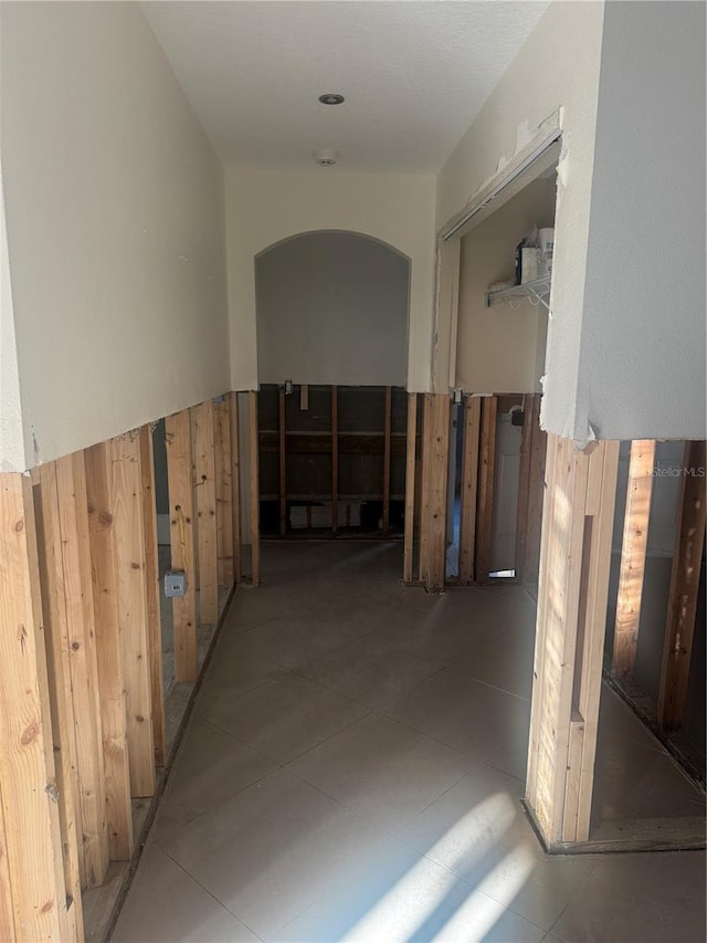 hallway with wooden walls