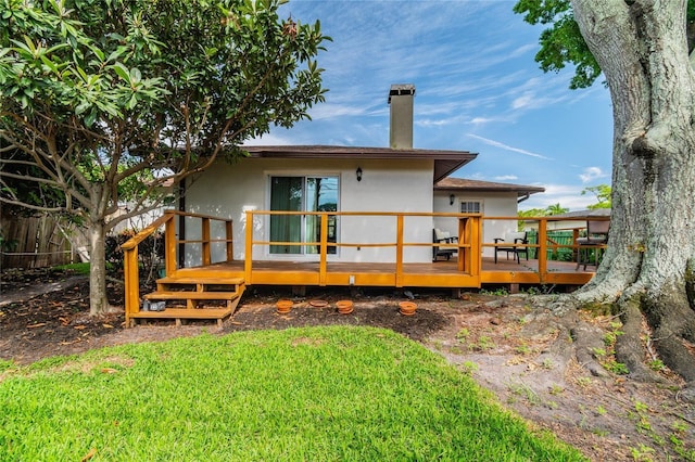 rear view of house with a deck