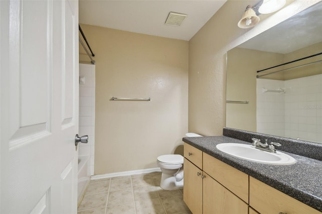 full bathroom with tile patterned floors, vanity, toilet, and shower / washtub combination