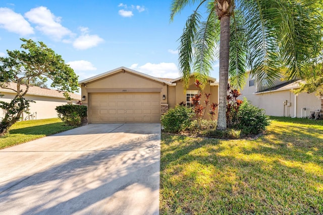 single story home with a front lawn and a garage