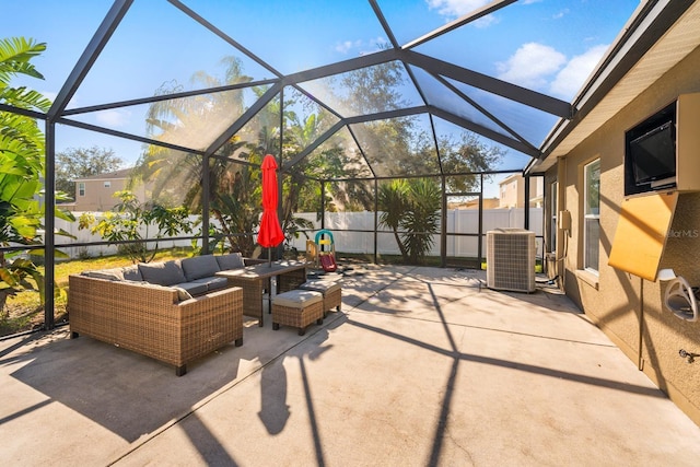 view of patio / terrace with glass enclosure, an outdoor hangout area, and central AC