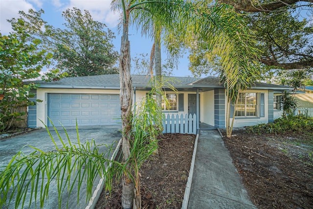 single story home with a garage