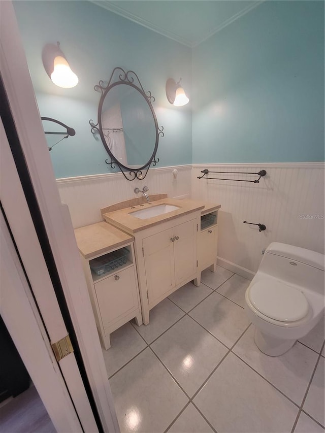 bathroom with tile patterned floors, vanity, and toilet