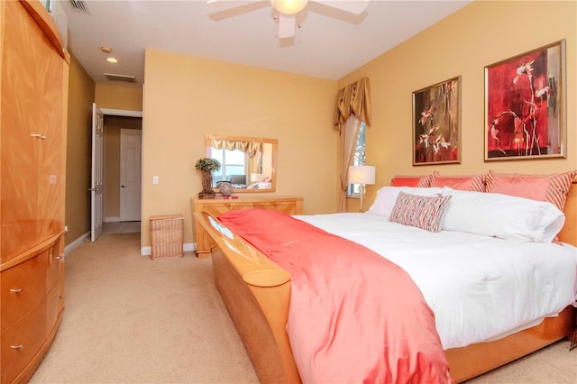 carpeted bedroom with ceiling fan