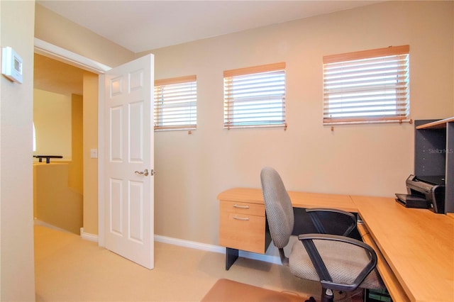 office area with light colored carpet