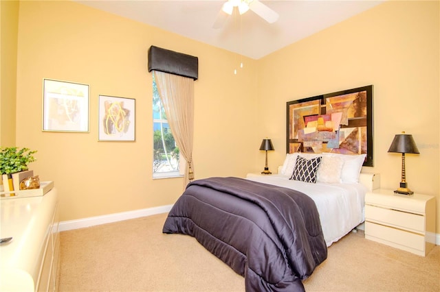 bedroom with light carpet and ceiling fan