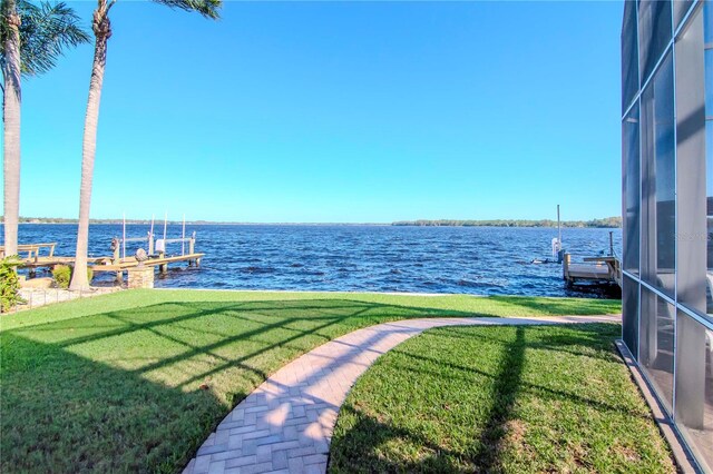 property view of water featuring a boat dock