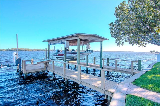 view of dock with a water view