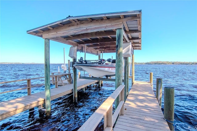 dock area featuring a water view