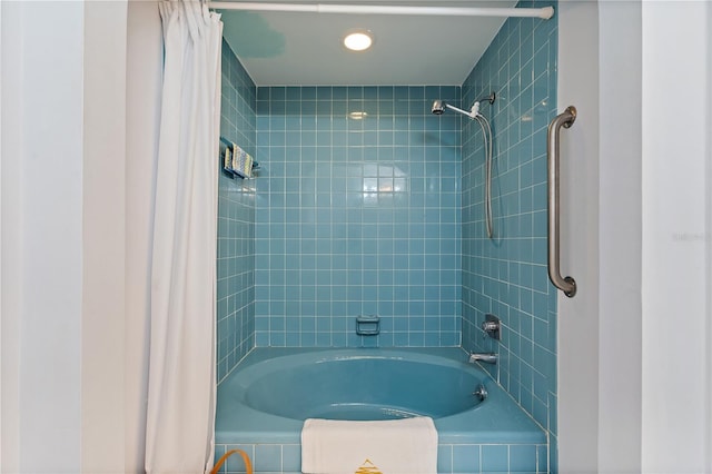 bathroom featuring shower / bath combination with curtain