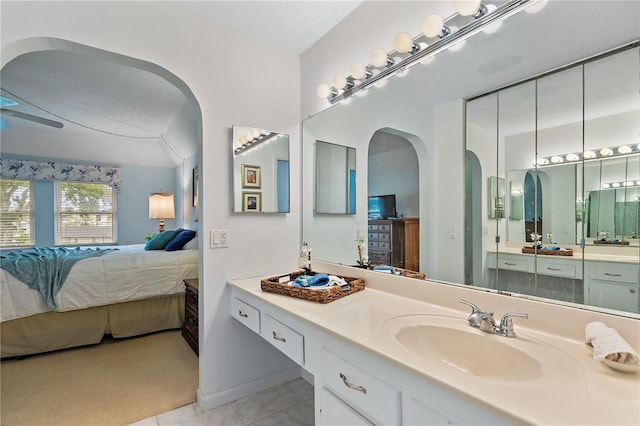 bathroom with vanity, tile patterned floors, and ceiling fan