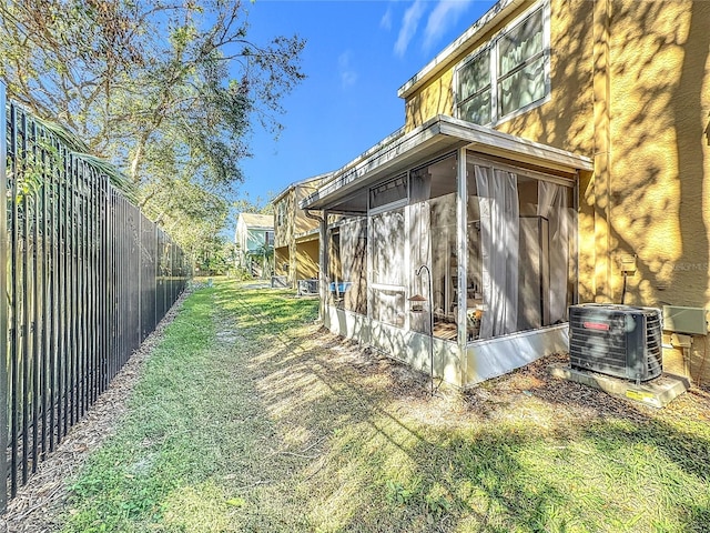 view of yard featuring central AC