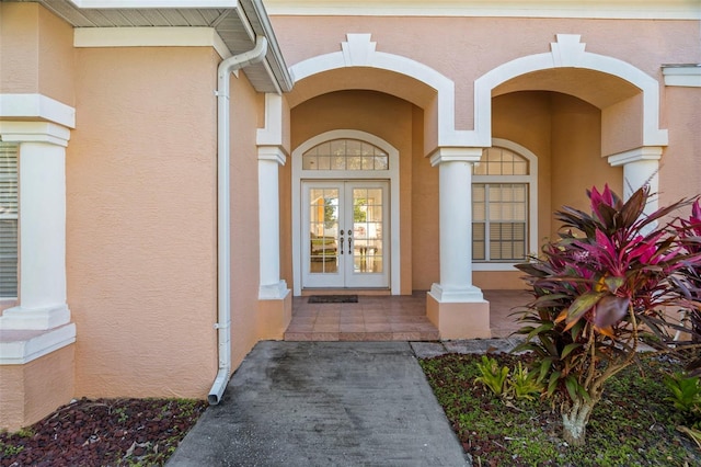 entrance to property with french doors and covered porch