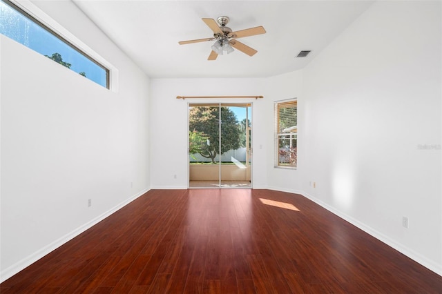 unfurnished room with ceiling fan and wood-type flooring