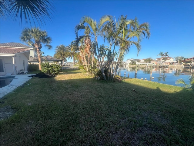 view of yard with a water view