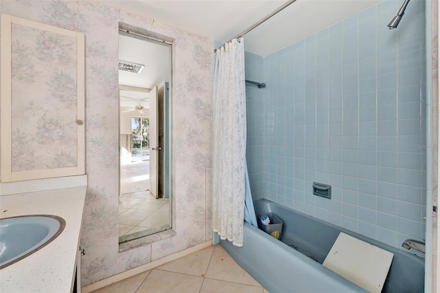 bathroom featuring vanity, ceiling fan, tile patterned flooring, and shower / bathtub combination with curtain