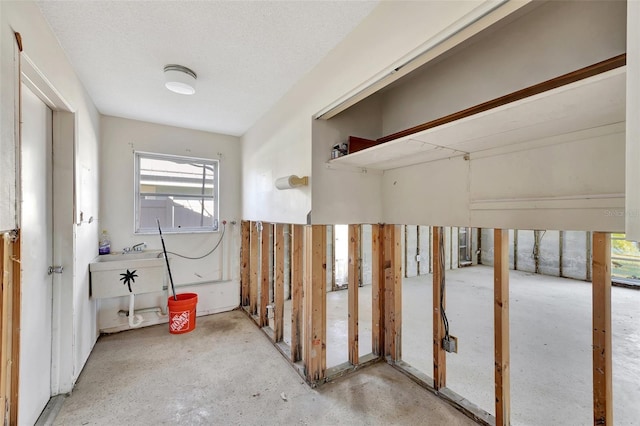 interior space with a textured ceiling