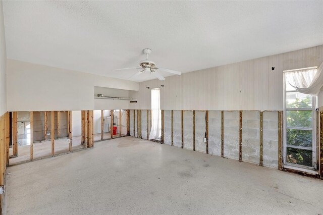 unfurnished room featuring ceiling fan