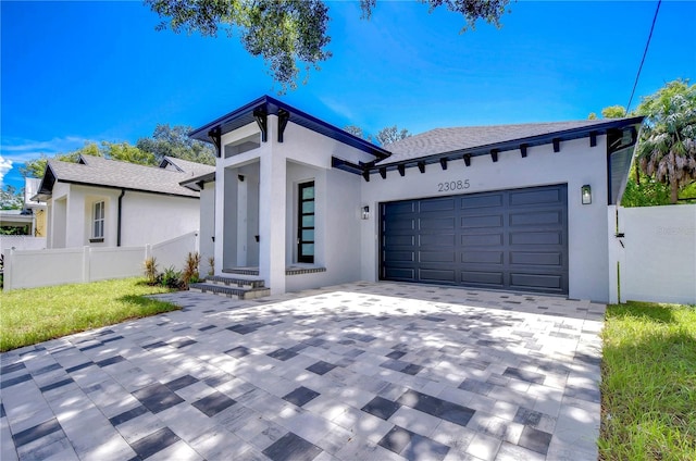 view of front of house with a garage