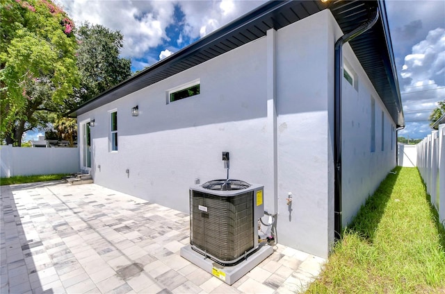 view of patio with central AC unit