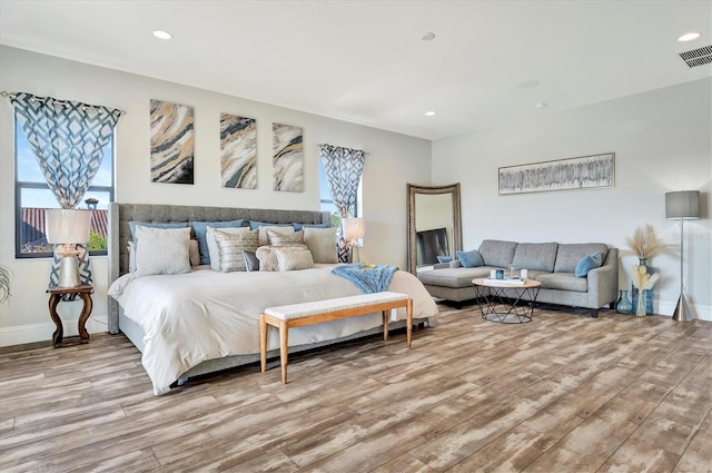 bedroom featuring light wood-type flooring