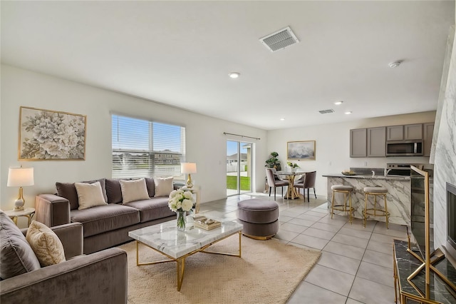 living room featuring light tile patterned flooring