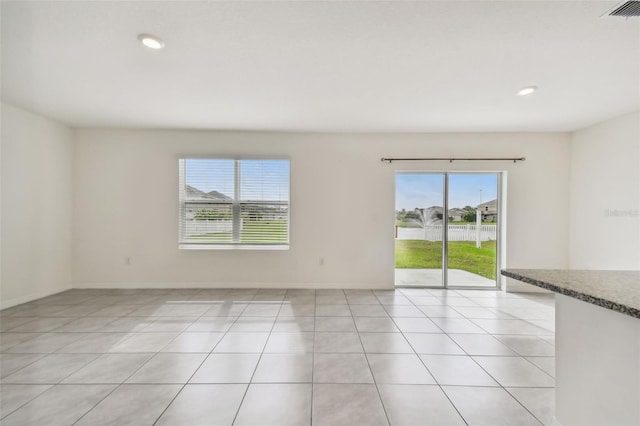 view of tiled spare room