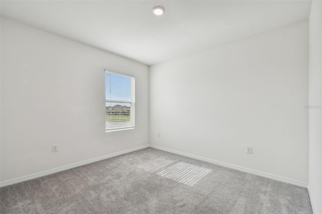 spare room with carpet flooring