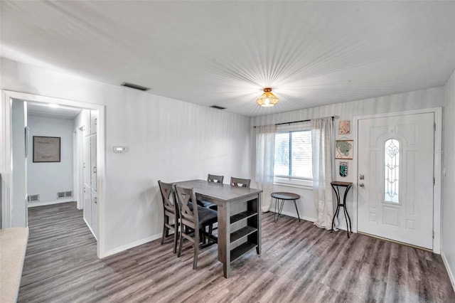 dining room featuring wood-type flooring