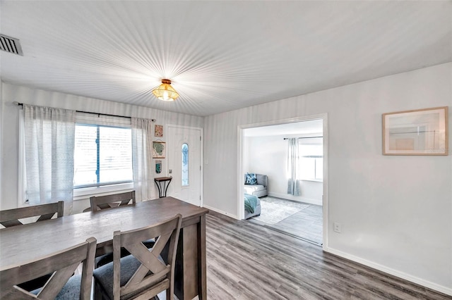 dining room featuring hardwood / wood-style flooring