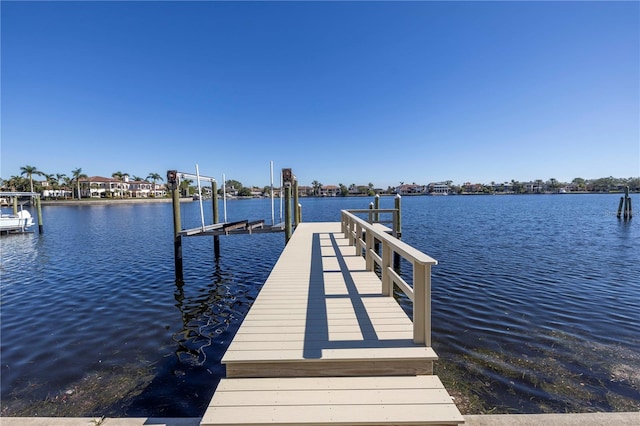 dock area featuring a water view