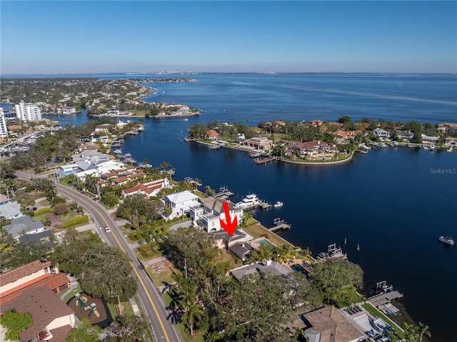 bird's eye view with a water view