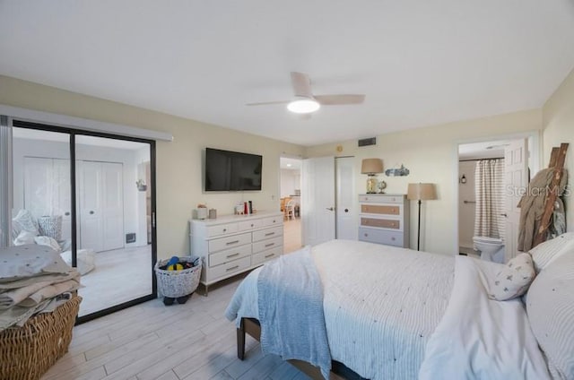 bedroom with light hardwood / wood-style flooring and ceiling fan