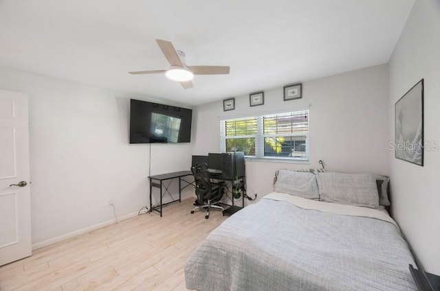 bedroom featuring ceiling fan and light hardwood / wood-style flooring