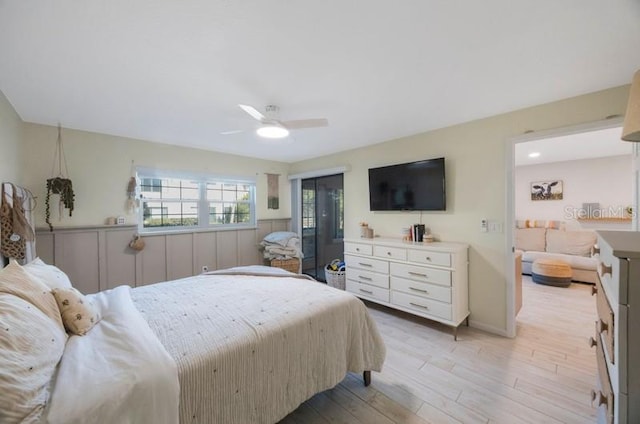 bedroom featuring ceiling fan and light hardwood / wood-style flooring