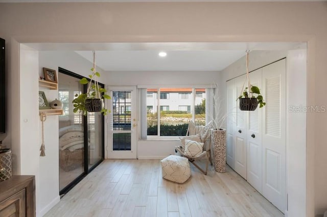 sitting room featuring light wood-type flooring