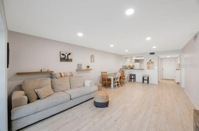 living room featuring light hardwood / wood-style floors