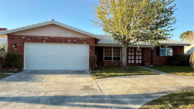 single story home featuring a garage