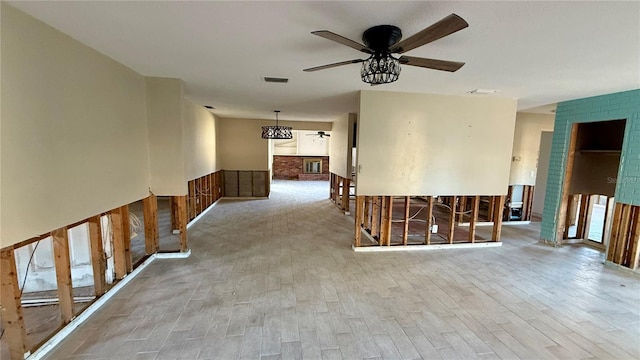 unfurnished room featuring ceiling fan and light hardwood / wood-style floors